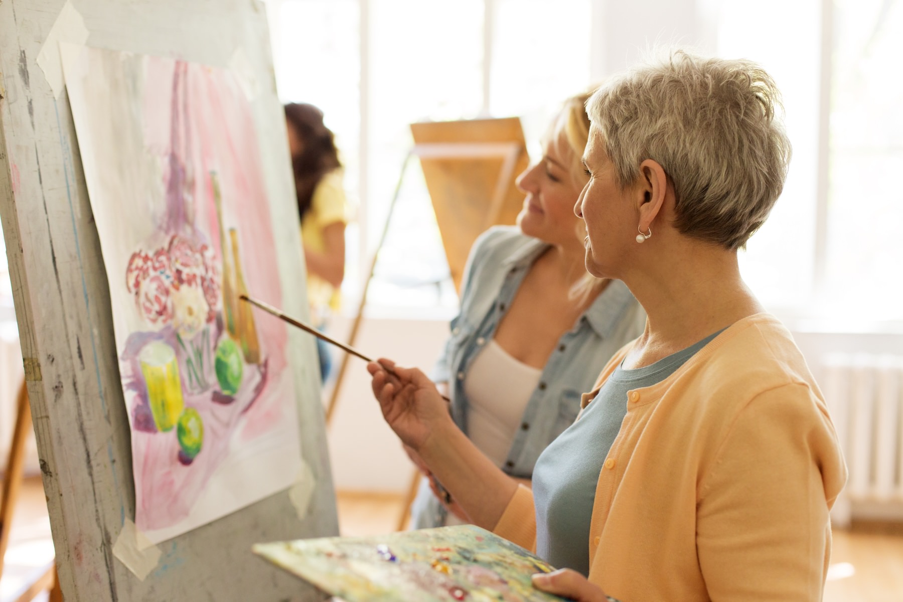 two women painting