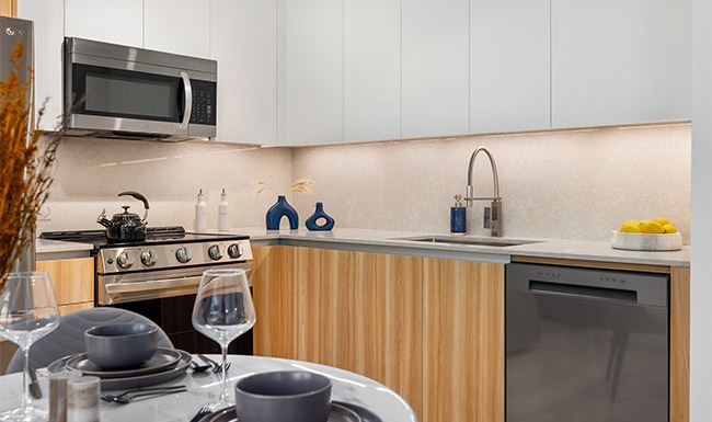 a kitchen with white cabinets