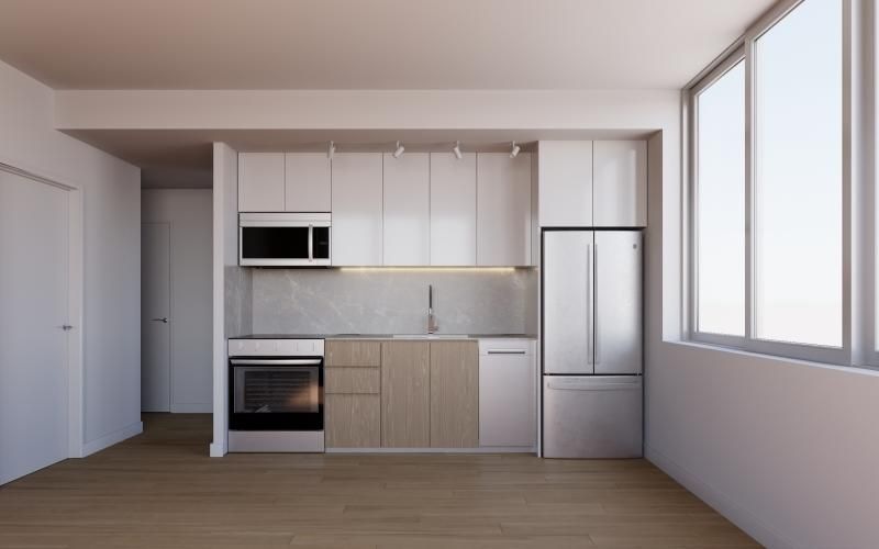 a kitchen with white cabinets